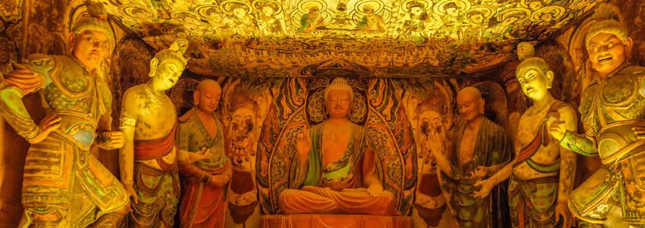 Buddhist figures in a cave-art setting associated with the Dunhuang region