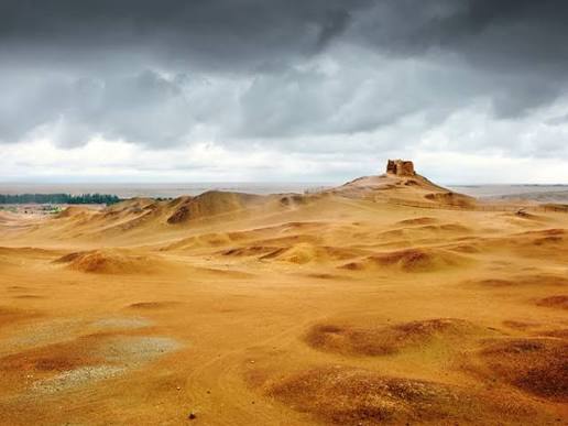Earthen remains and open landscape at Yang Pass near Dunhuang